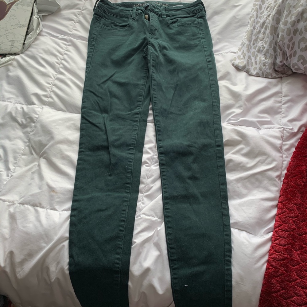 Green skinny jeans